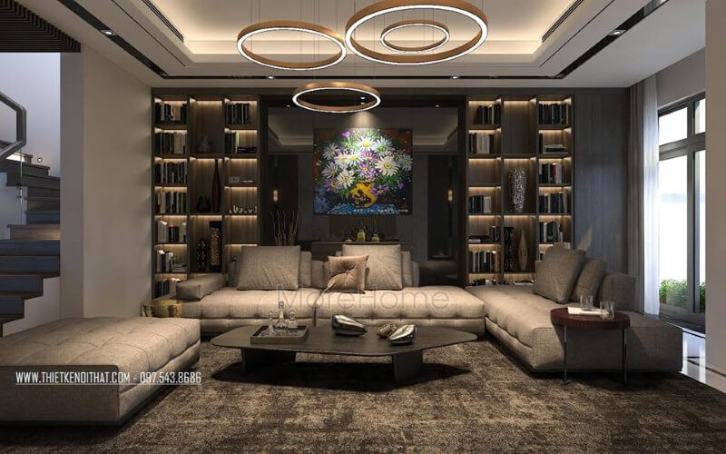 Bố trí nội thất phòng khách hiện đại, đẹp với bộ bàn ghế sofa lớn, kệ ốp tường, tranh treo tường. Thiết kế phòng khách biệt thự